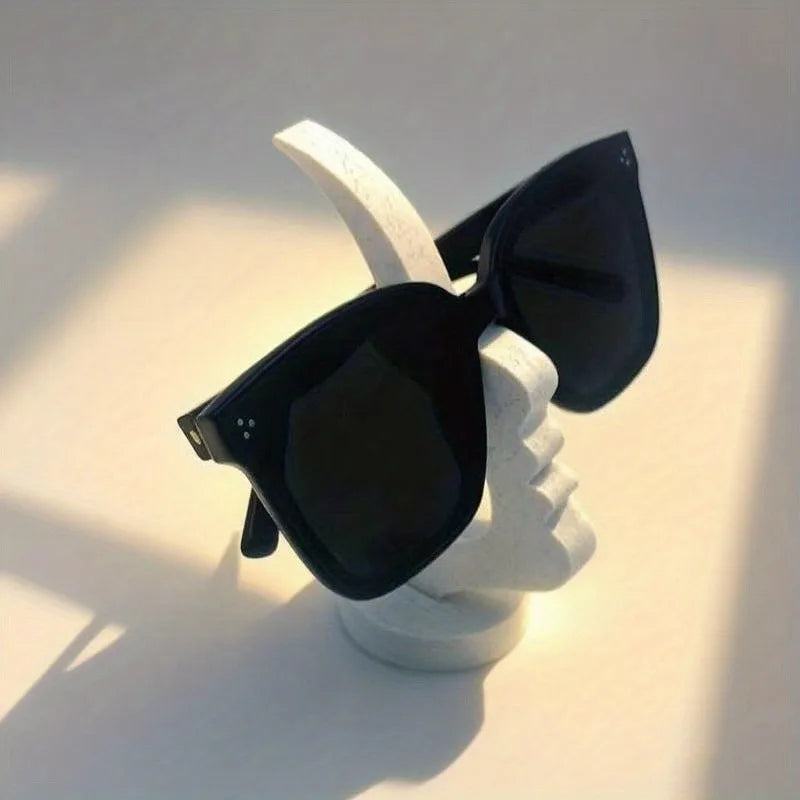 Elegant Side Face Glasses Holder - Minimalist Black Design, Secure