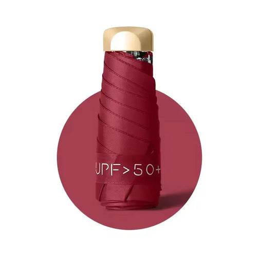 Mini paraguas de bolsillo para lluvia, sombrilla plegable de vinilo